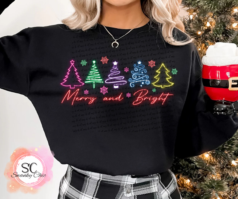 Kim Updegraff — Neon merry & bright trees: 3X, black, crewneck tee