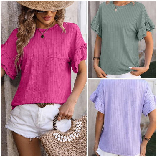 Shannen Carter — Large, pink textured top with ruffled flounce sleeves