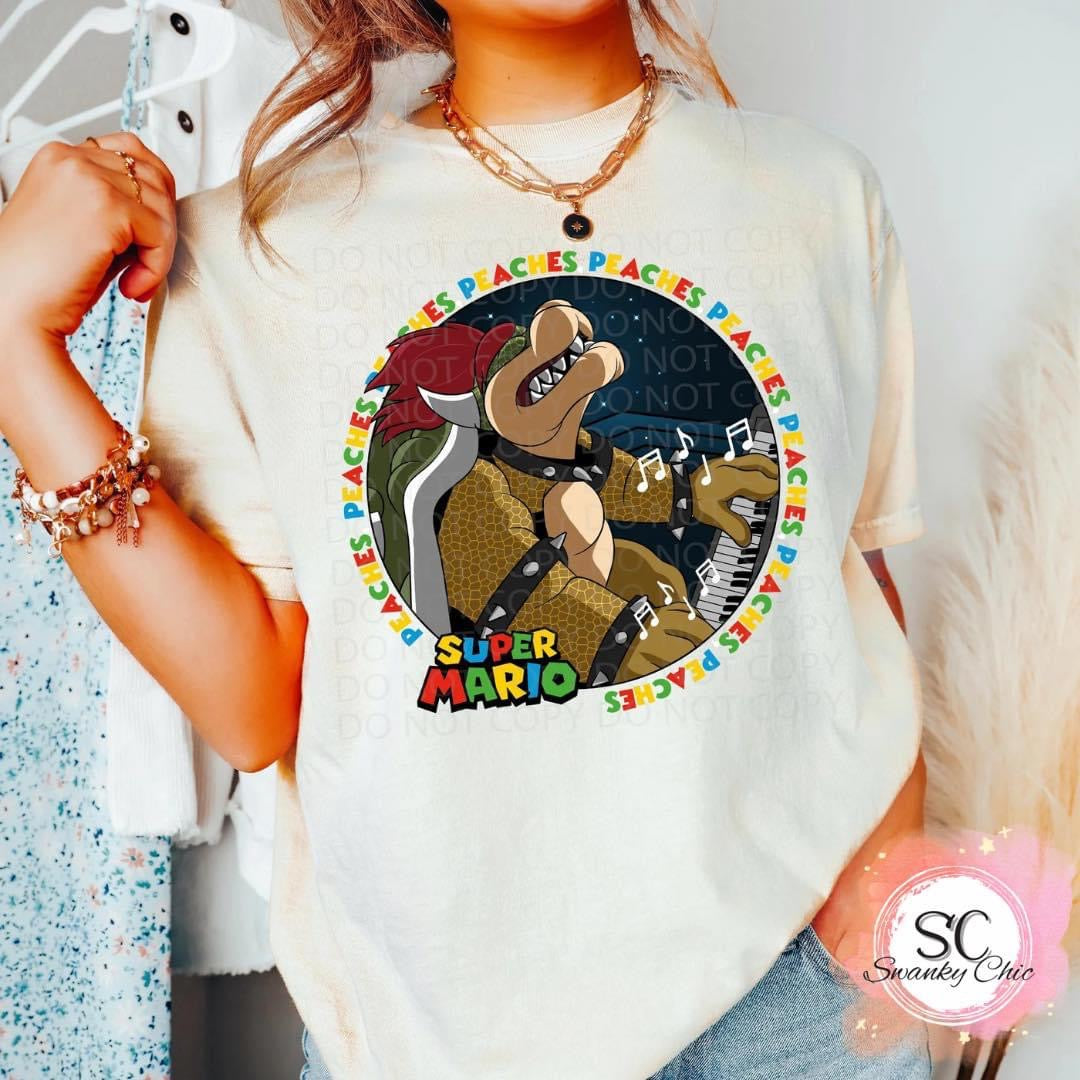 Jessica Fakhoury — Peaches piano: 2T, as is crewneck tee