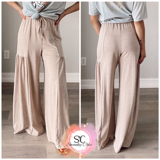 Paige Kelly — Small, wide leg pants with pleats.