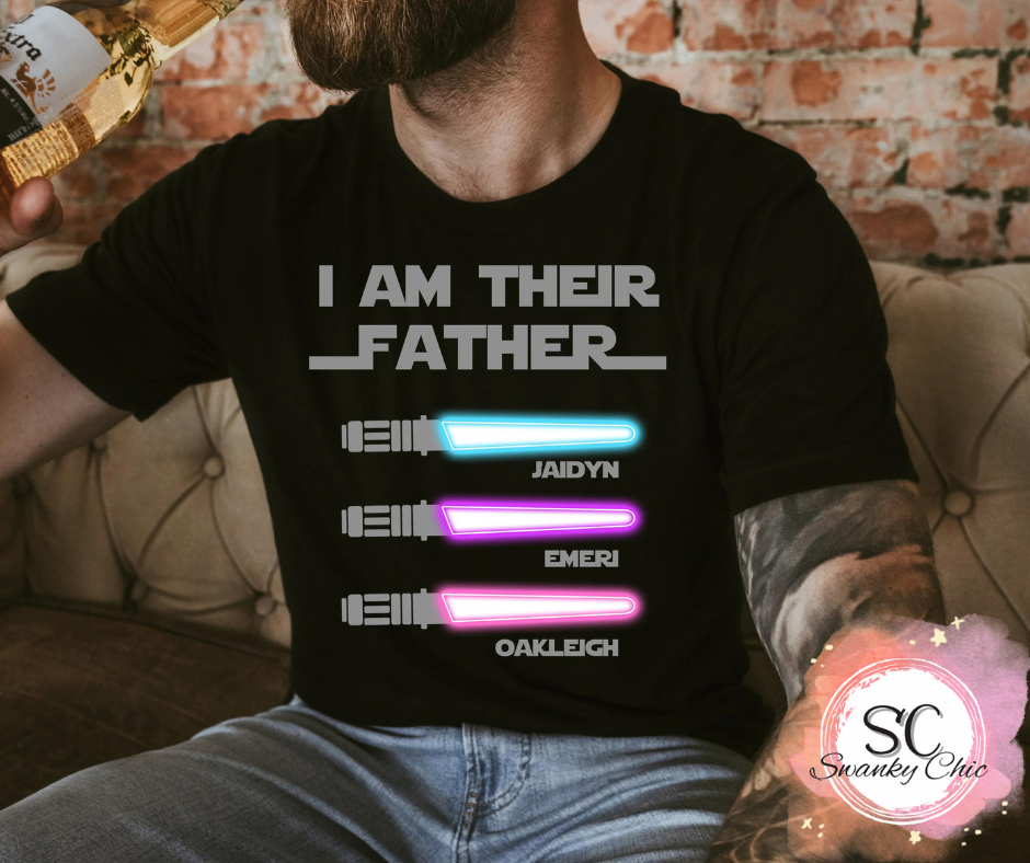 Amy Gossett — I am their father: (Bentley-BLUE) (Charlie Sue-PINK) 2X, black, crewneck tee