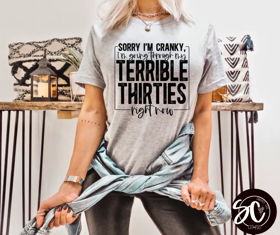 Angi Symons — Terrible thirties: Large, v-neck tee