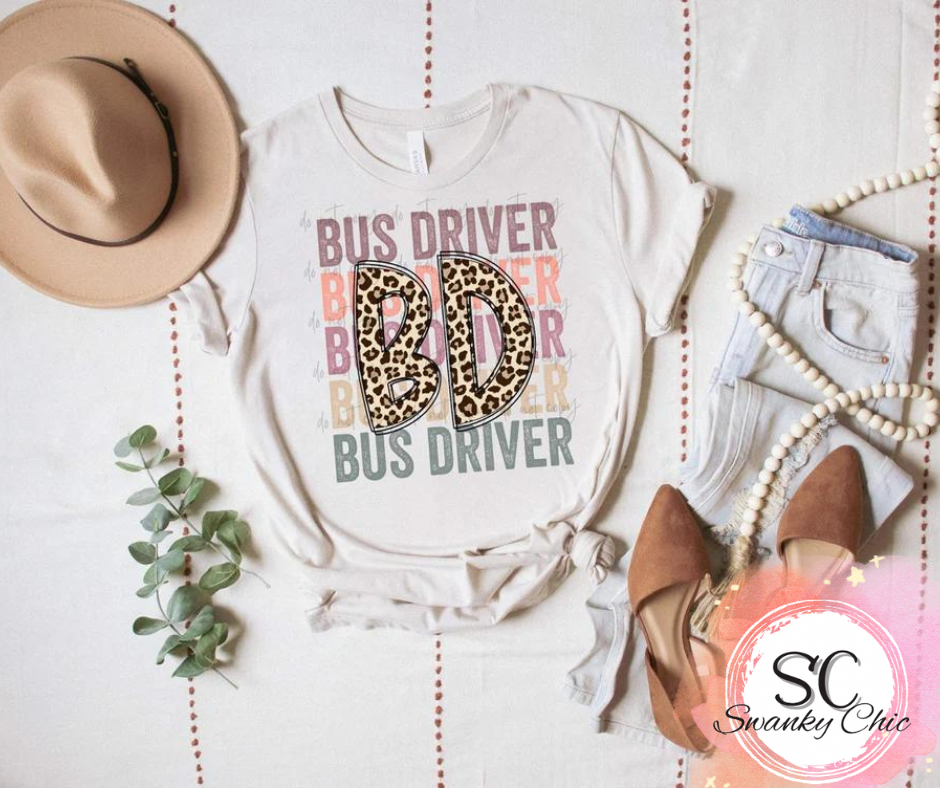 Melinda Pennington — Leopard Bus driver: 3X, crewneck tee