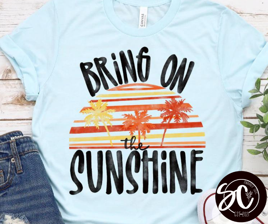 Amber Brown — Bring on the sunshine: Medium, ice blue, crewneck tee