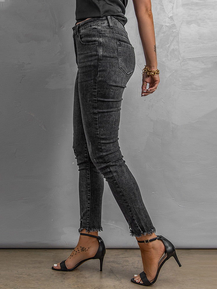 Shannen Carter — Large, smoke, frayed skinnies