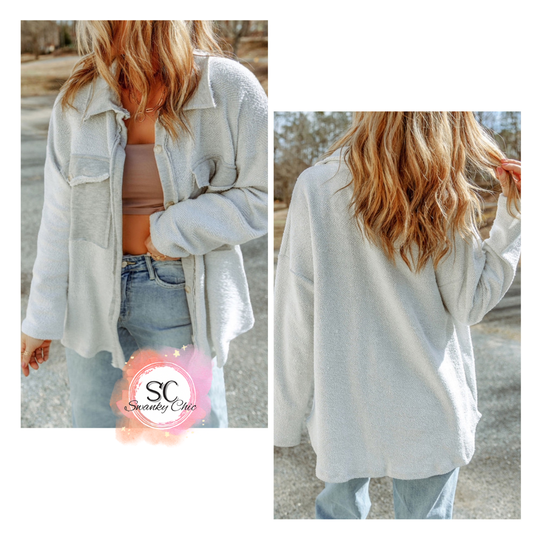 Chandra Falcone — 1X, Grey button up shacket with raw detailing, pockets and a collar