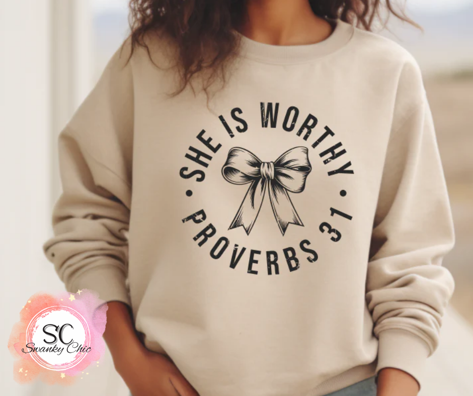 Kaylynn Mitchell — She is worthy Prov 31: Medium, (Sand)Gildan 18000, crewneck sweatshirt