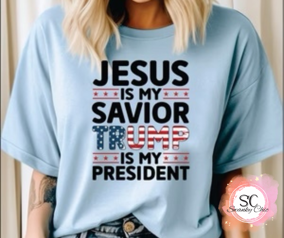 Marcie Jo Clark Houghton — Jesus is my Savior & Trump is my president: Medium, light blue, crewneck tee