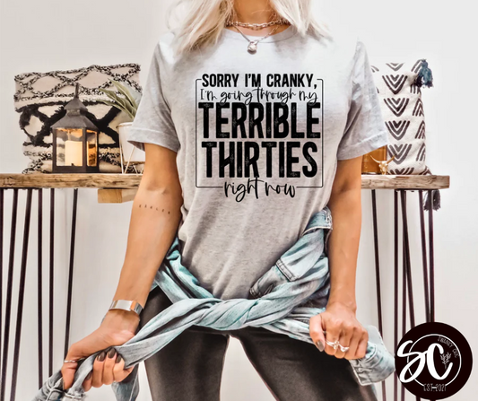 Angi Symons — Terrible thirties:  Large, v-neck tee