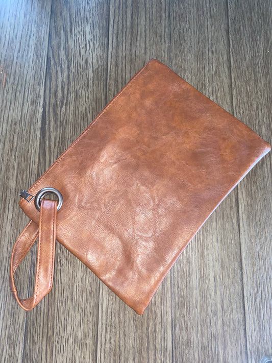 Susan Dungan — cognac, wrist bag